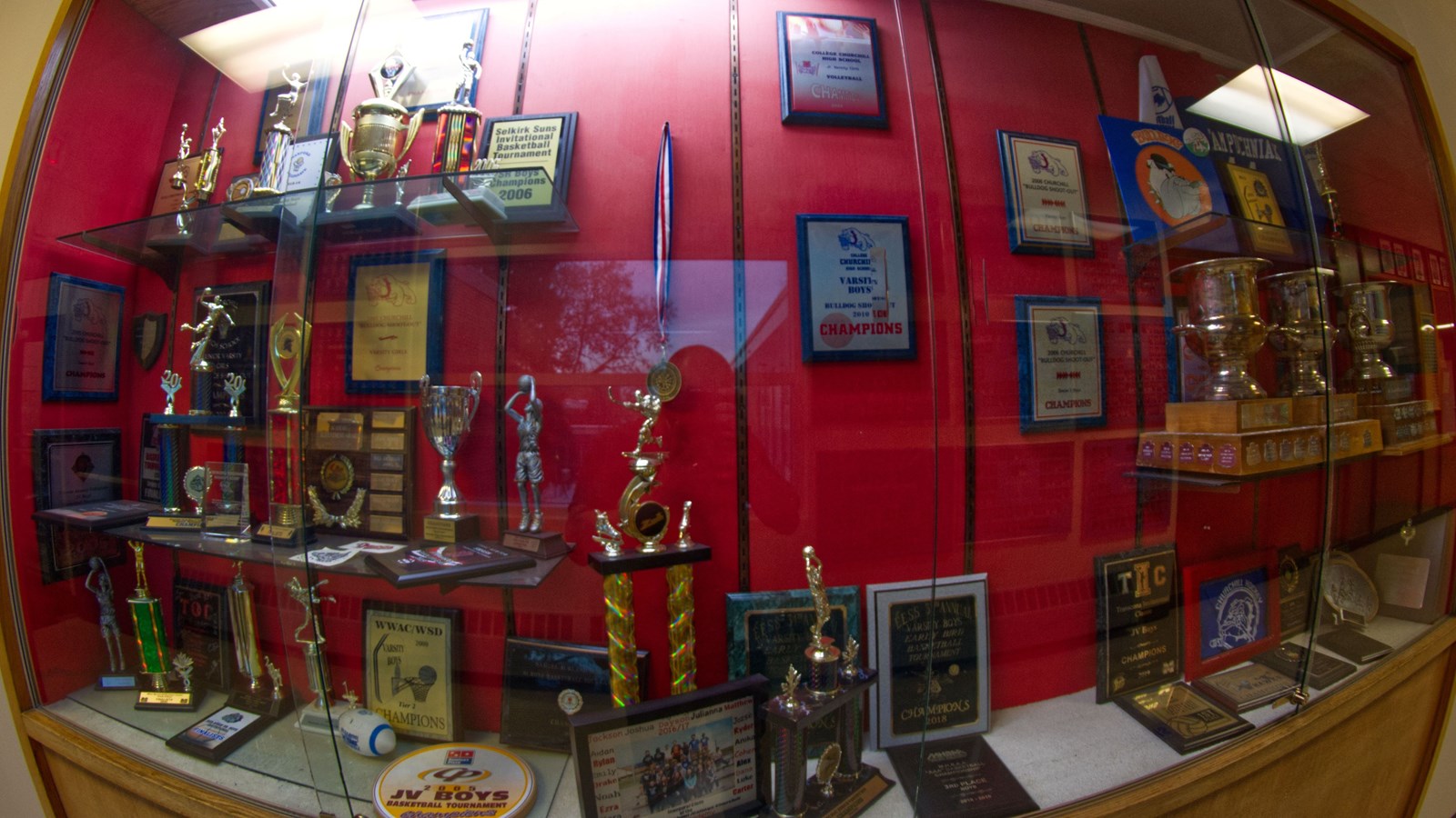 High school trophy cases in Jackson area full of championships and