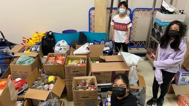 Tyndall Students with food items