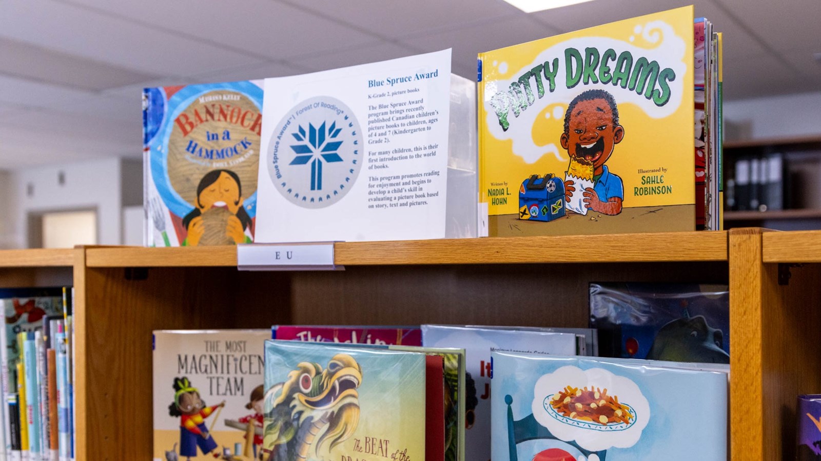 The divisional library features award-winning books that inspire reading and learning across grade levels.