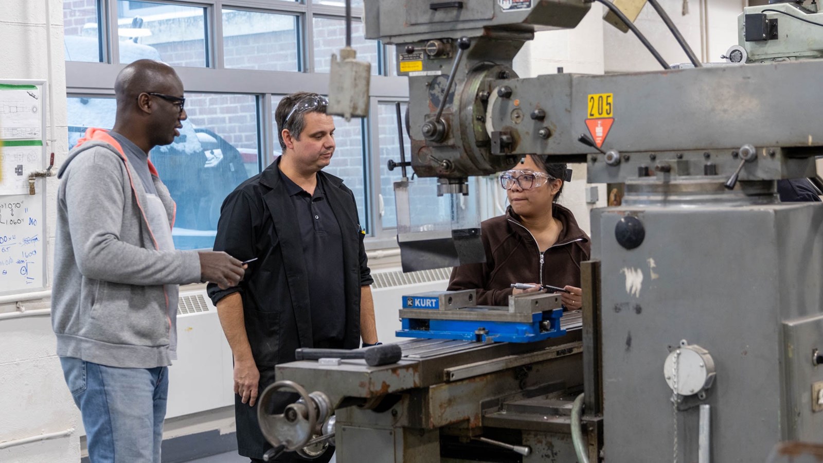 Drew Tapley AMMOP Program with students Tec Voc