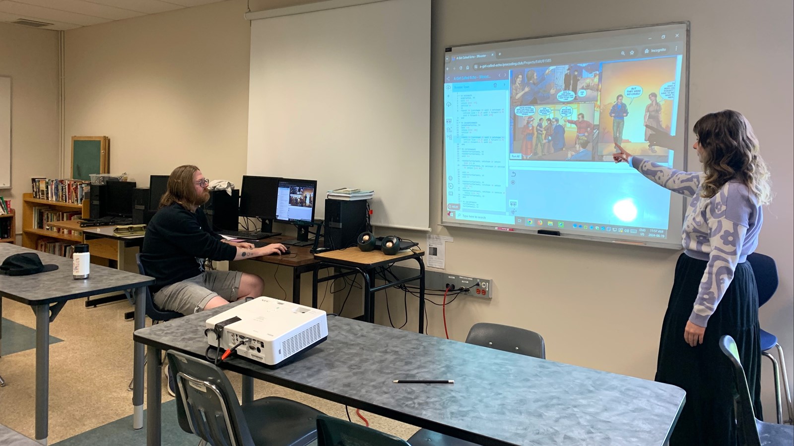James Young working with his student Kyra on the project.