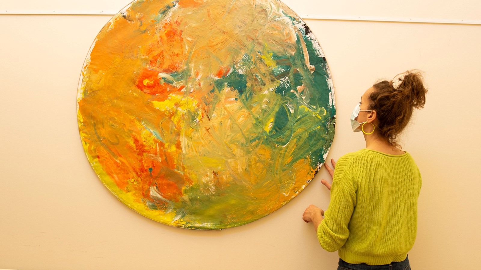 Talitha Kaethler hangs artwork at Seven Oak General Hospital
